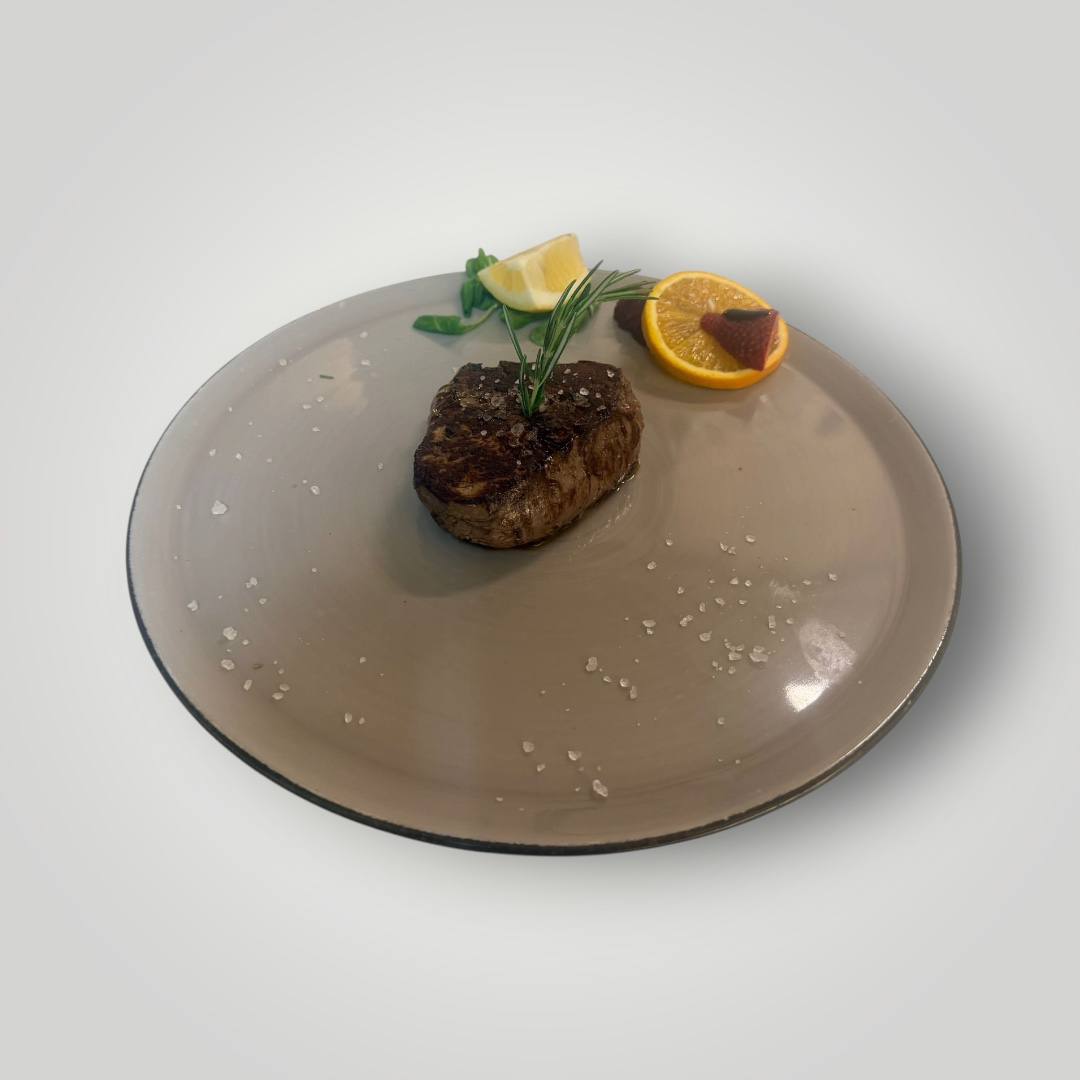 Taglio di carne locale cotta a carbone